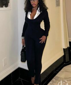 Combinaison femme habillée professionnelle noire ajustée ceinturée