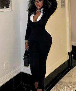Combinaison femme habillée professionnelle noire ajustée ceinturée