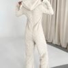 Combinaison tricot torsadé écru zippée à capuche